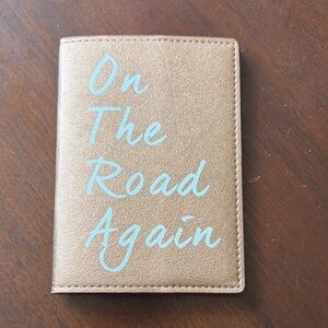 Metallic Gold Passport Cover with White Script - "On The Road Again"
